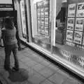 Suey walks past an estate agents, Pre-Christmas Roundup: Wigs, Beers and Kebabs, Diss, Norfolk - 24th December 2005