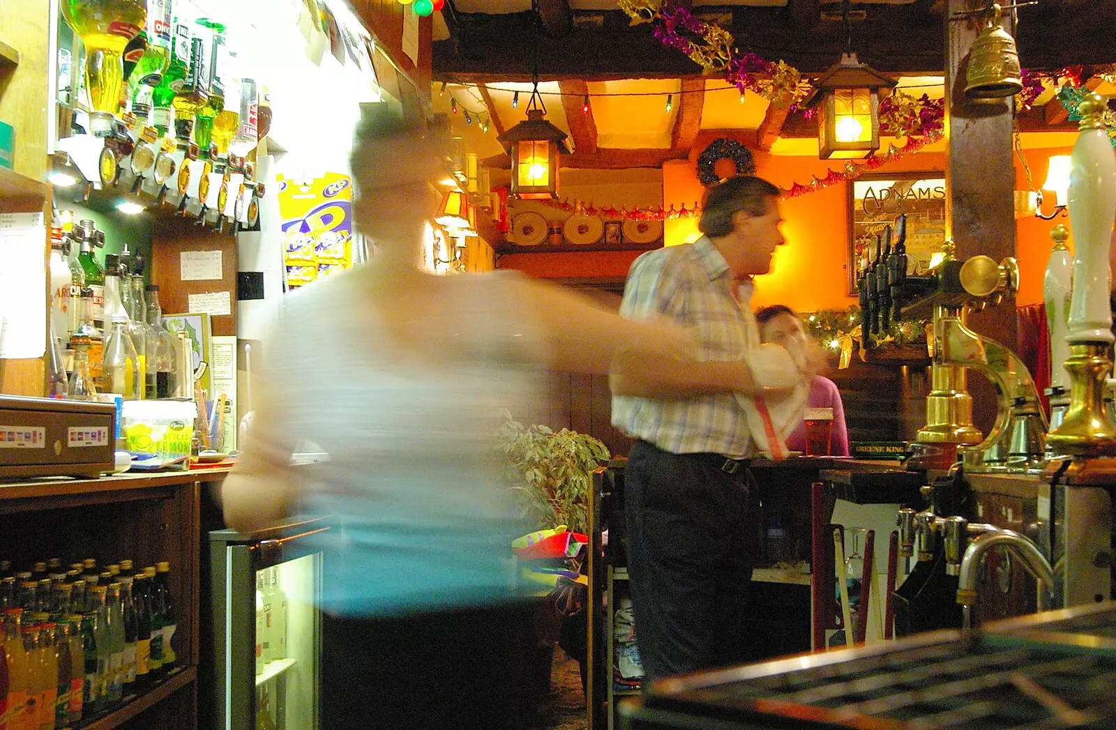 Sylvia is a blur of action behind the bar, from Pre-Christmas Roundup: Wigs, Beers and Kebabs, Diss, Norfolk - 24th December 2005