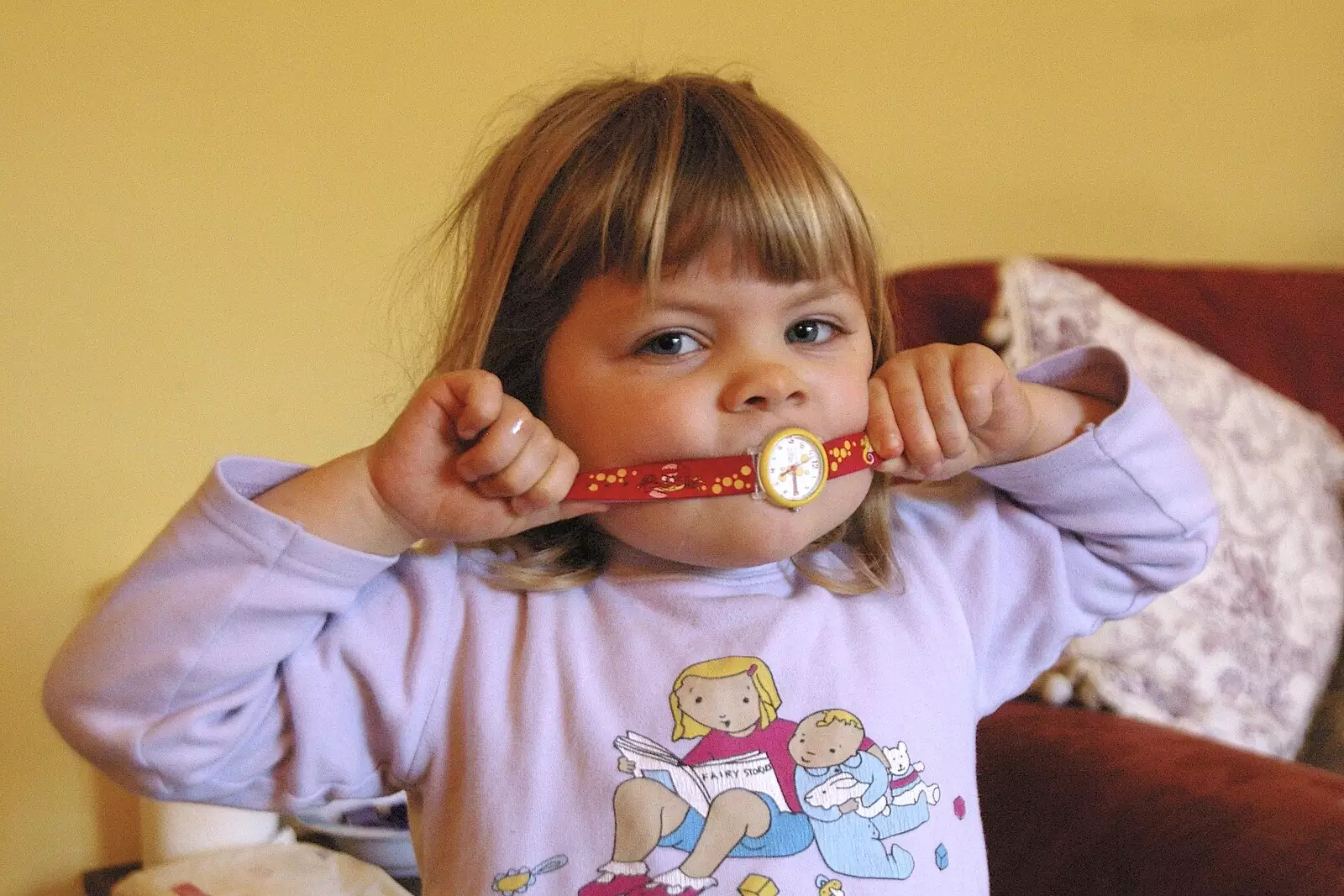 Sydney plays around with a watch, from Boxing Day Miscellany, Hordle and Barton-on-Sea, Hampshire - 26th December 2005