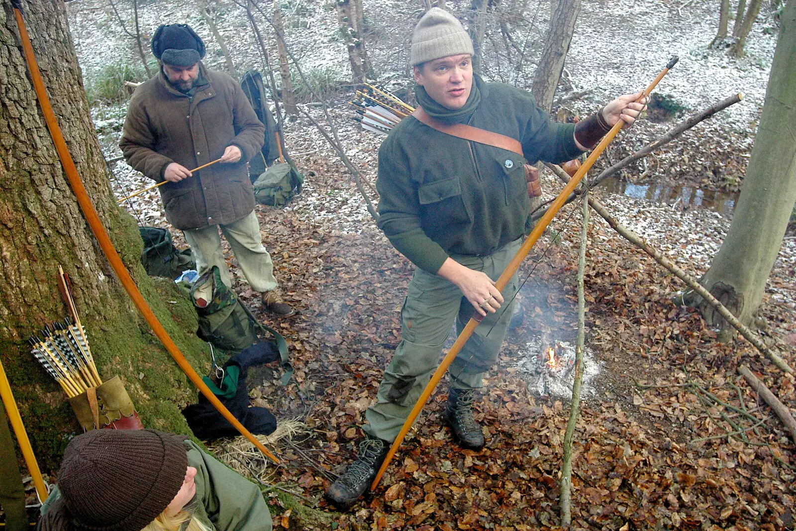 Ray warms his longbow up over embers, from Walk Like a Shadow: A Day With Ray Mears, Ashdown Forest, East Sussex - 29th December 2005