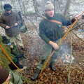 Ray warms his longbow up over embers, Walk Like a Shadow: A Day With Ray Mears, Ashdown Forest, East Sussex - 29th December 2005