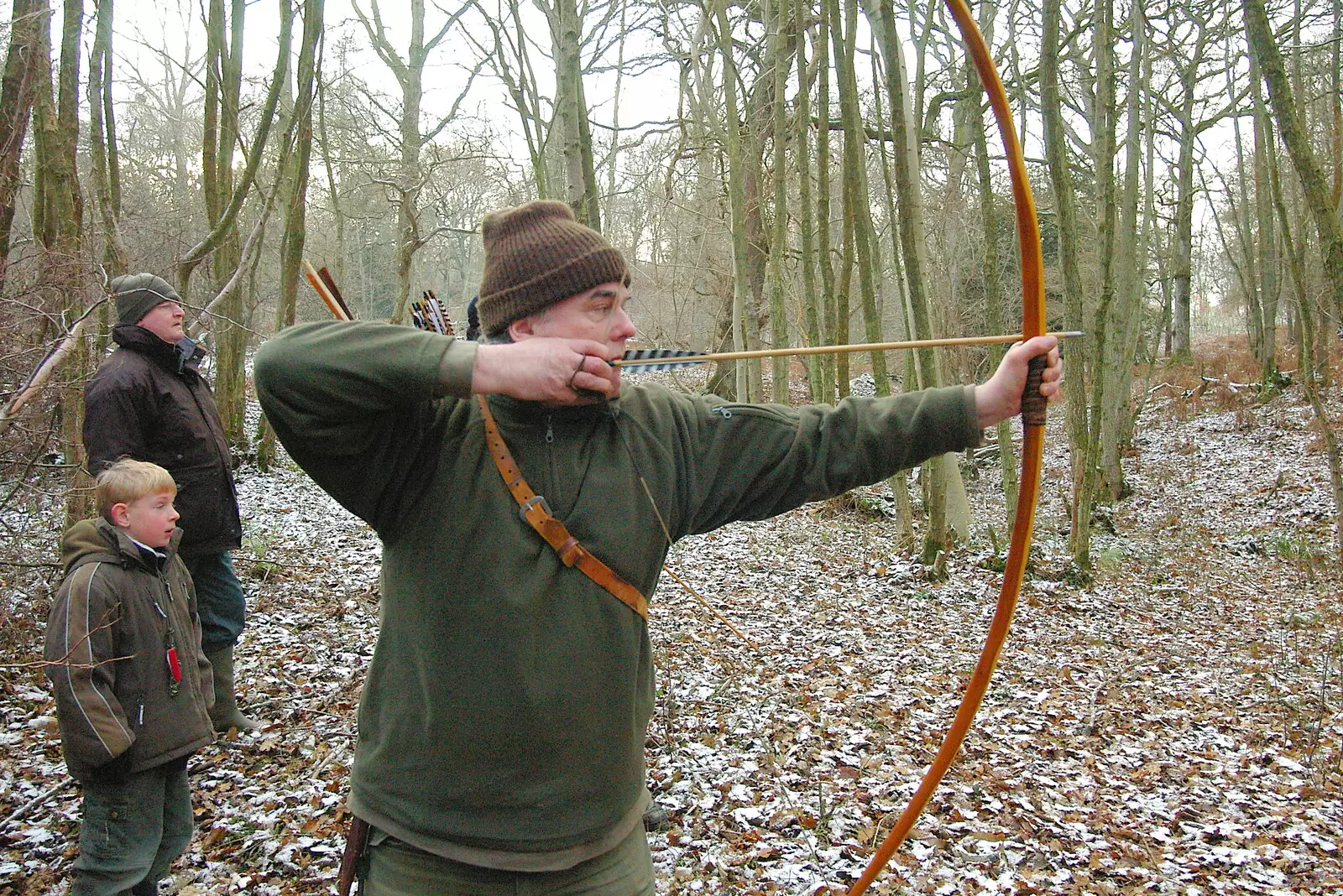 Chris Boyton lets an arrow off, from Walk Like a Shadow: A Day With Ray Mears, Ashdown Forest, East Sussex - 29th December 2005