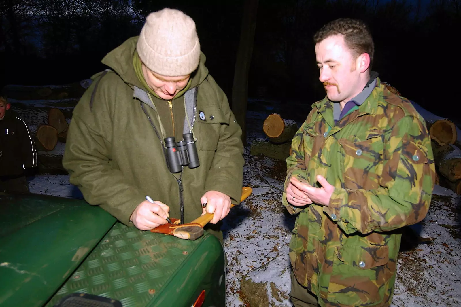 Ray signs an axe, from Walk Like a Shadow: A Day With Ray Mears, Ashdown Forest, East Sussex - 29th December 2005