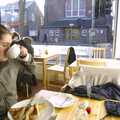 Isobel slurps a cappucino in the Black Cat Café, Cambridge Bins and Little Chef Dereliction, Kentford, Suffolk - 21st January 2006
