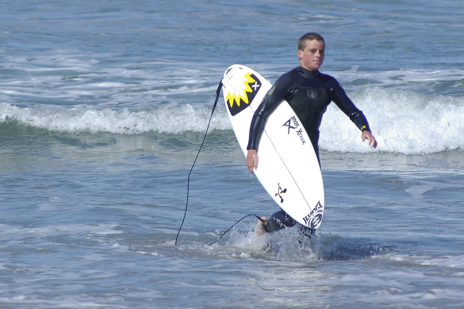 A surfer returns to the beach from Cruisin' Route 101, San Diego to Capistrano, California - 4th March 2006