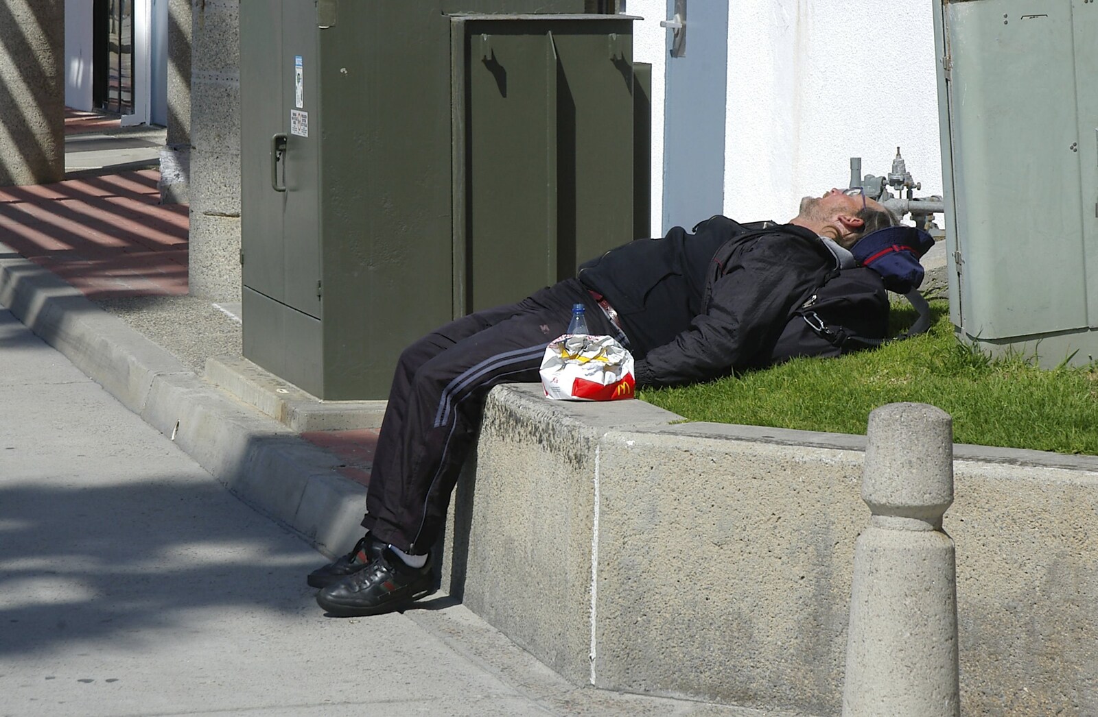 Some bloke takes a nap in the sun from Cruisin' Route 101, San Diego to Capistrano, California - 4th March 2006