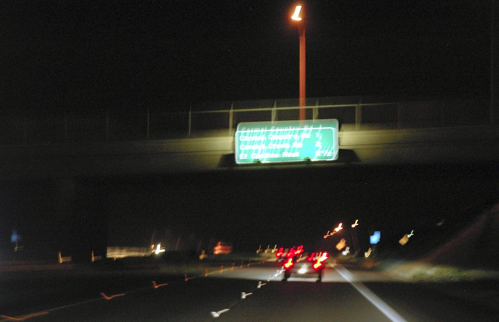 Signs on the freeway at night from San Diego Misc: Beaches, Car Parks and Airports, San Diego, California, US - 4th March 2006