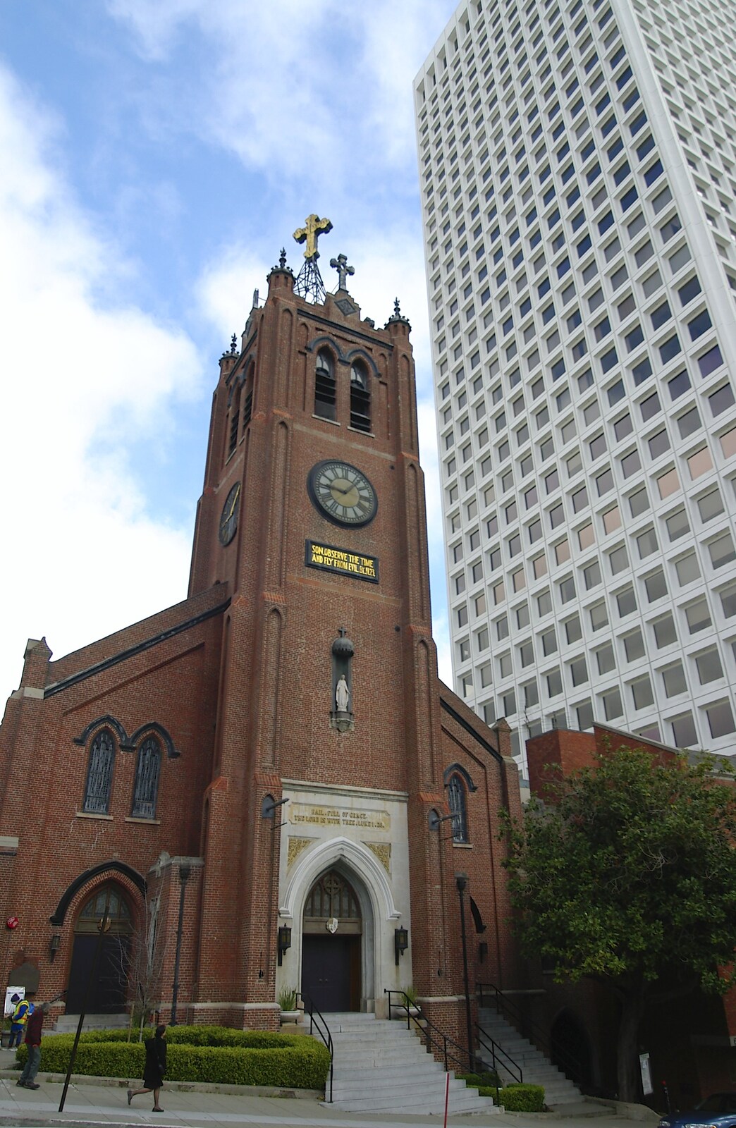 A church, intimidated by an adjacent office block from Chinatown, Telegraph Hill and Fisherman's Wharf, San Francisco, California, US - 11th March 2006