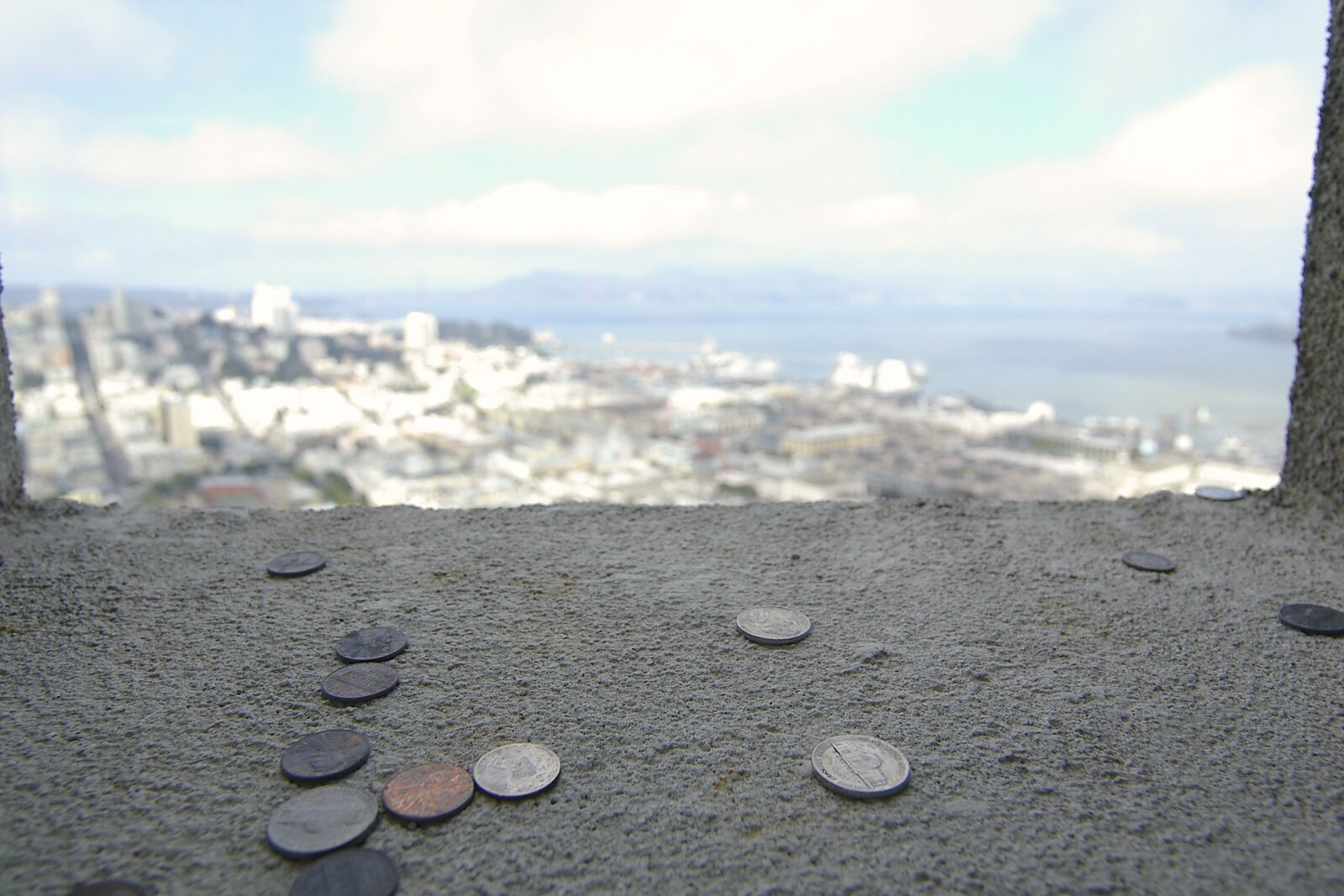 Coins on the ledges of Coit Tower from Chinatown, Telegraph Hill and Fisherman's Wharf, San Francisco, California, US - 11th March 2006