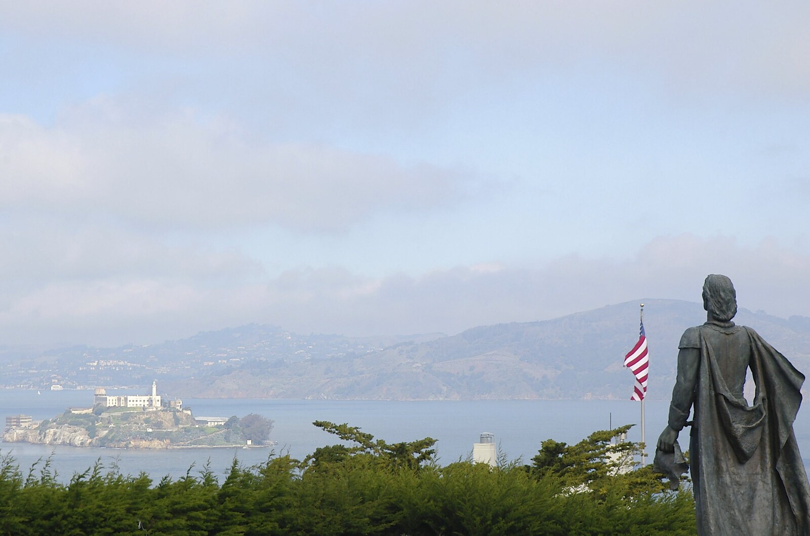 A statue stares out at Alcatraz Island from Chinatown, Telegraph Hill and Fisherman's Wharf, San Francisco, California, US - 11th March 2006