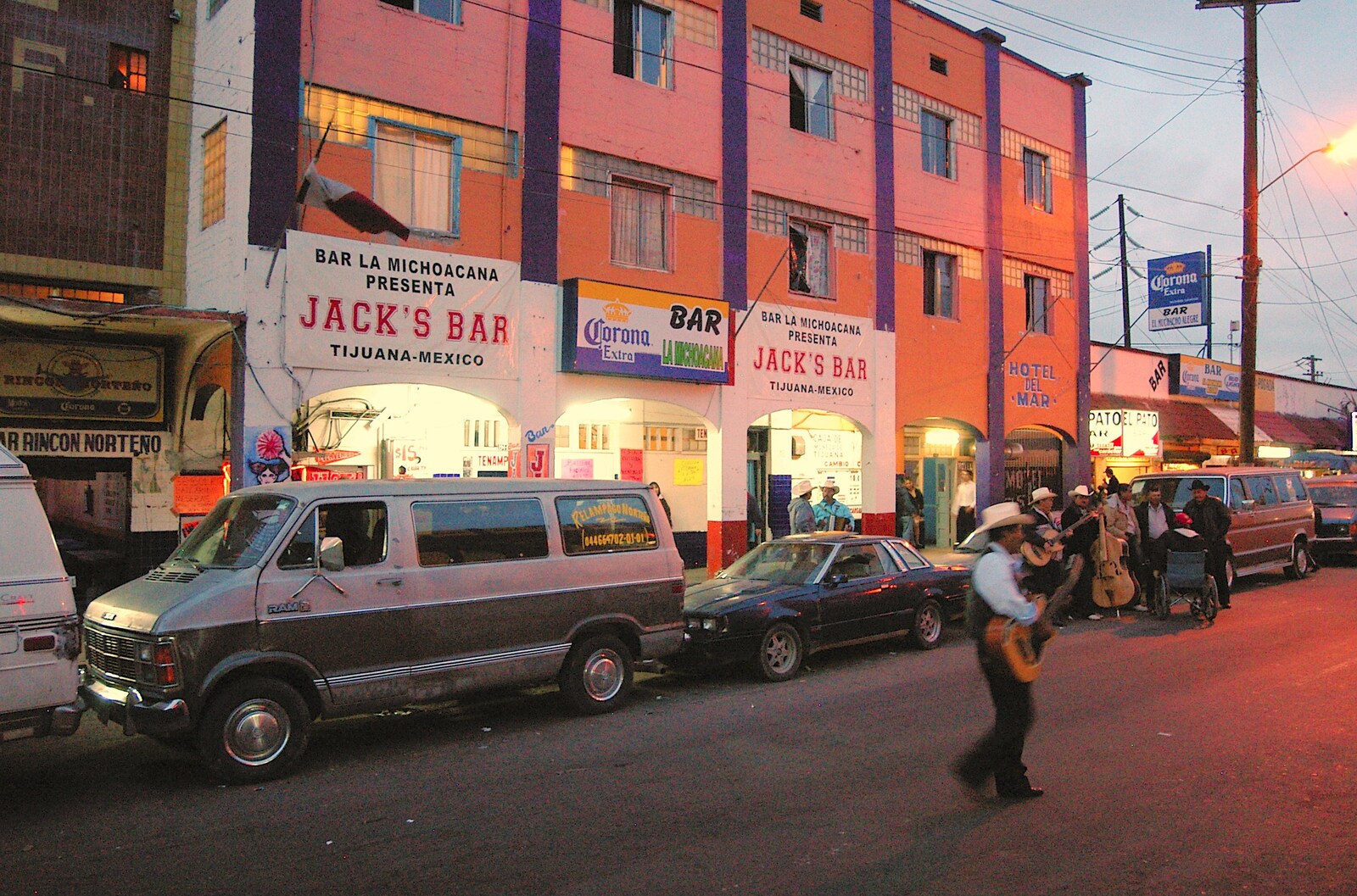 A Mariachi guitarist crosses the street from A Trip to Tijuana, Mexico - 25th March 2006