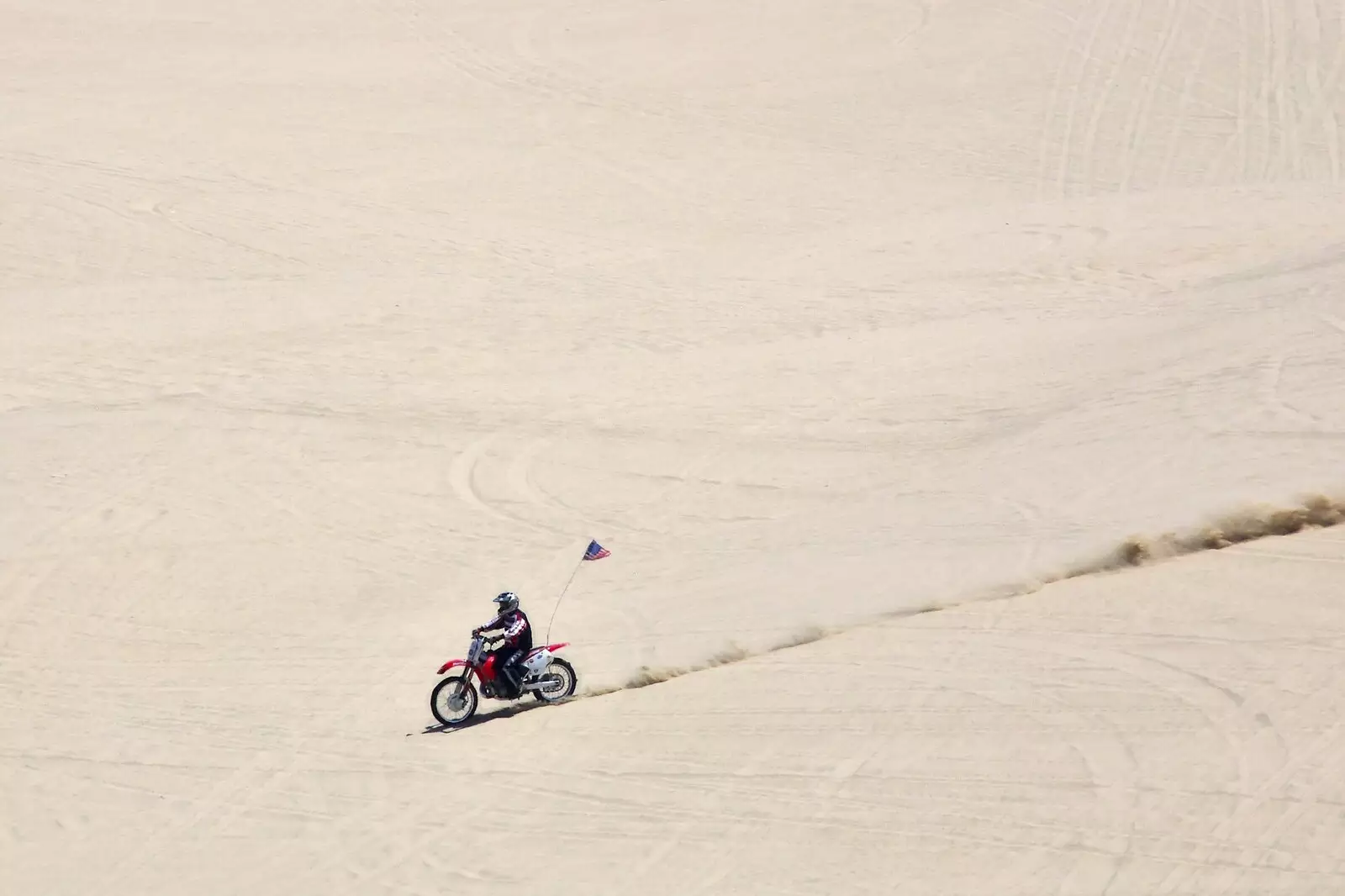 A guy on a bike razzes down a huge dune, from San Diego Seven: The Desert and the Dunes, Arizona and California, US - 22nd April