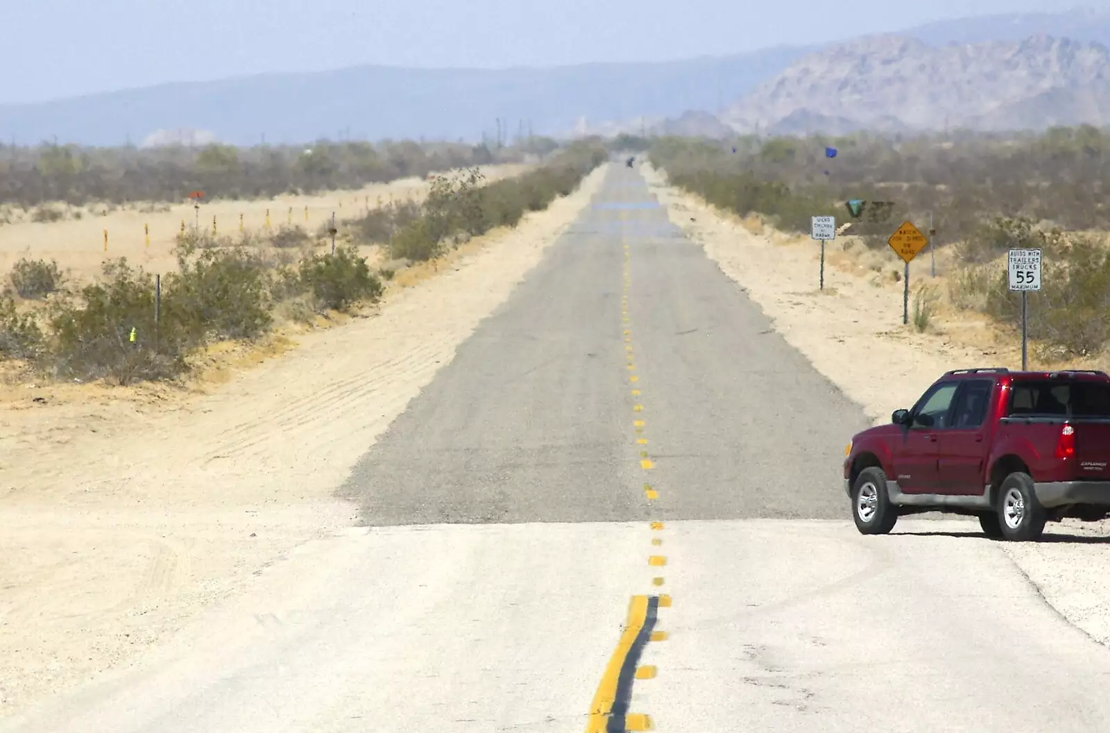 An SUV pulls out onto State Route 34, from San Diego Seven: The Desert and the Dunes, Arizona and California, US - 22nd April