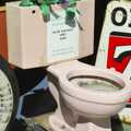 A porcelain toilet, used as a giant ash-tray, Times Square, the Empire State and Ground Zero, New York, US - 1st May 2006