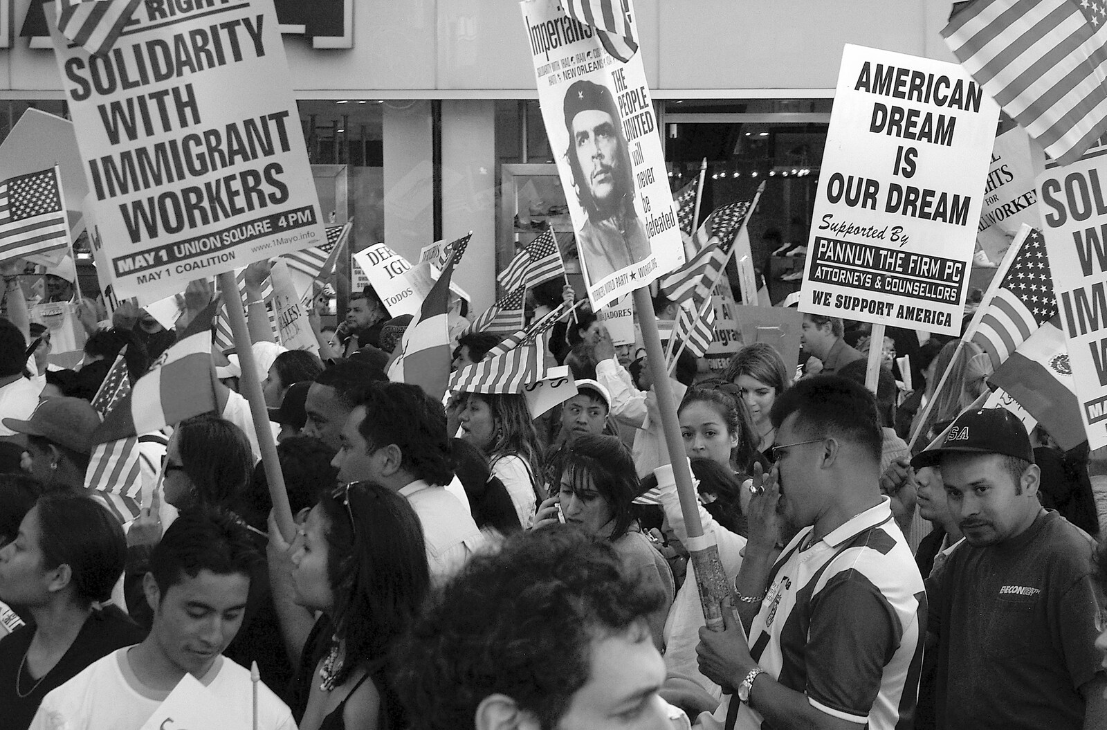 A placard of Che Guevara is waved around from A Union Square Demo, Bryant Park and Columbus Circle, New York, US - 2nd May 2006