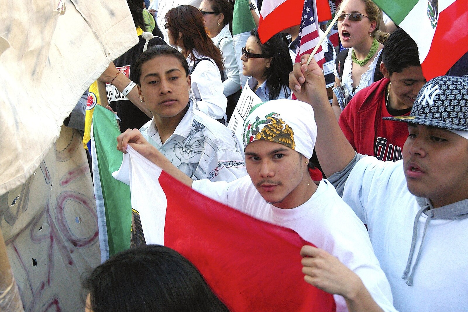 A young Mexican looks up from A Union Square Demo, Bryant Park and Columbus Circle, New York, US - 2nd May 2006
