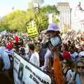 A baby is waved around, A Union Square Demo, Bryant Park and Columbus Circle, New York, US - 2nd May 2006