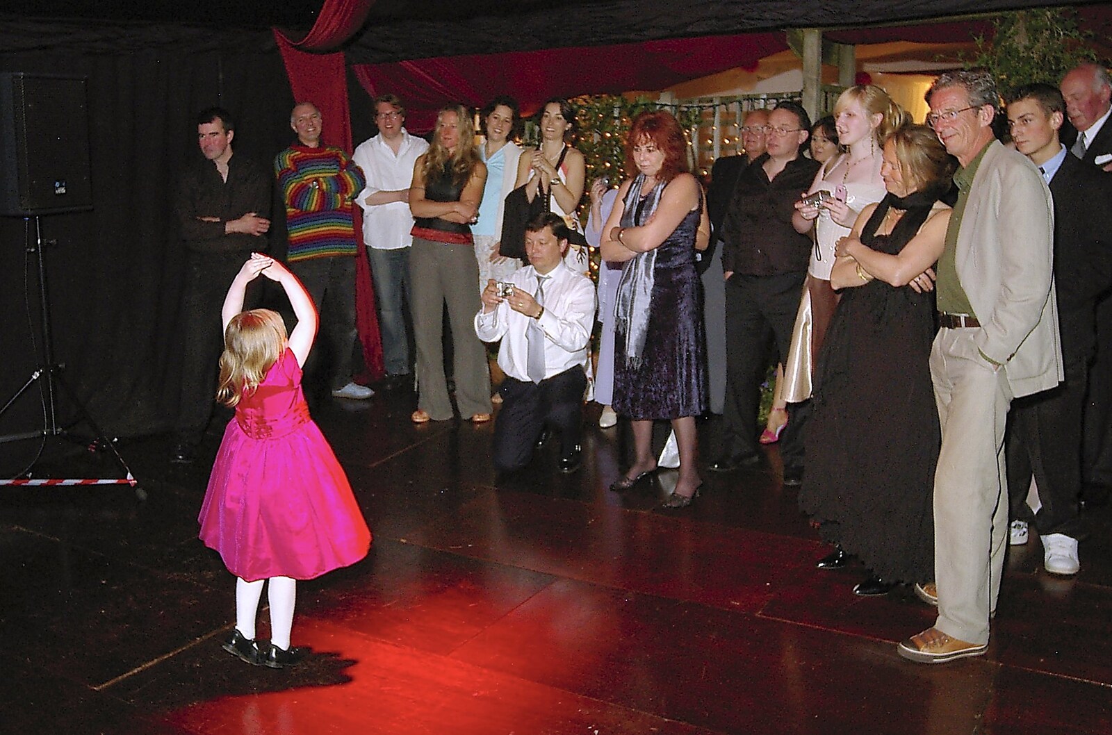 A small girl pirouettes as Lucy sings from Henry and Fiona's Wedding Reception, Oakley, Suffolk - 2nd June 2006