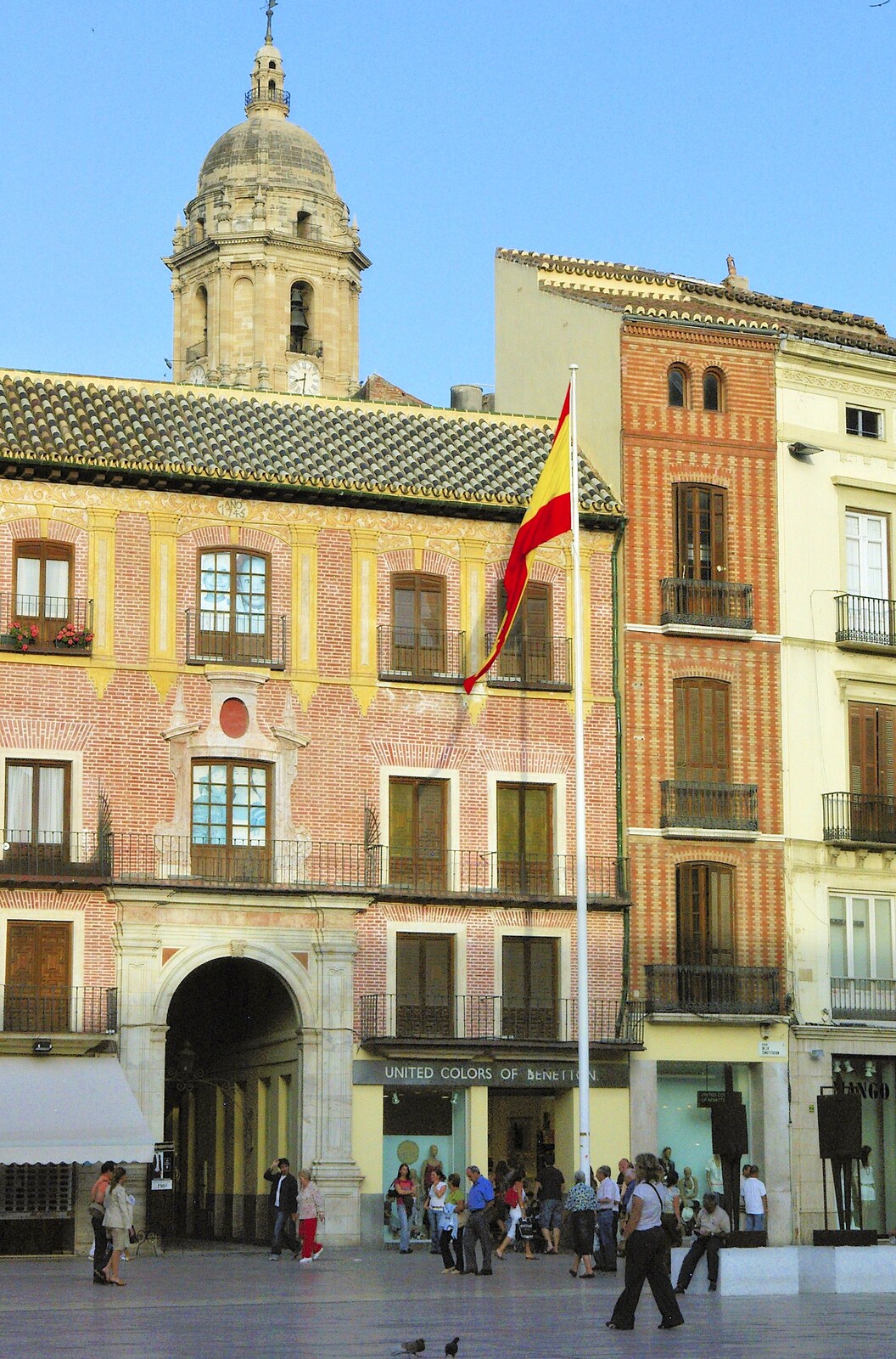 The Spanish flag flutters in a town square from Working at Telefónica, Malaga, Spain - 6th June 2006