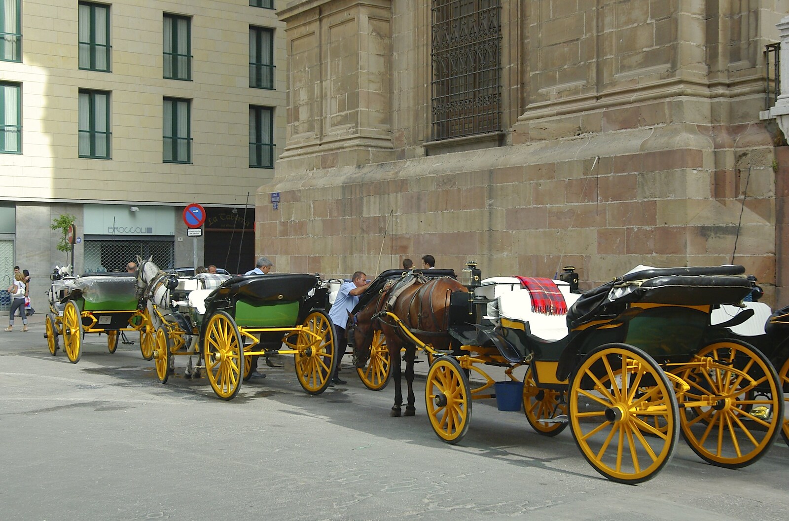 Horses and carts wait for tourists from Working at Telefónica, Malaga, Spain - 6th June 2006