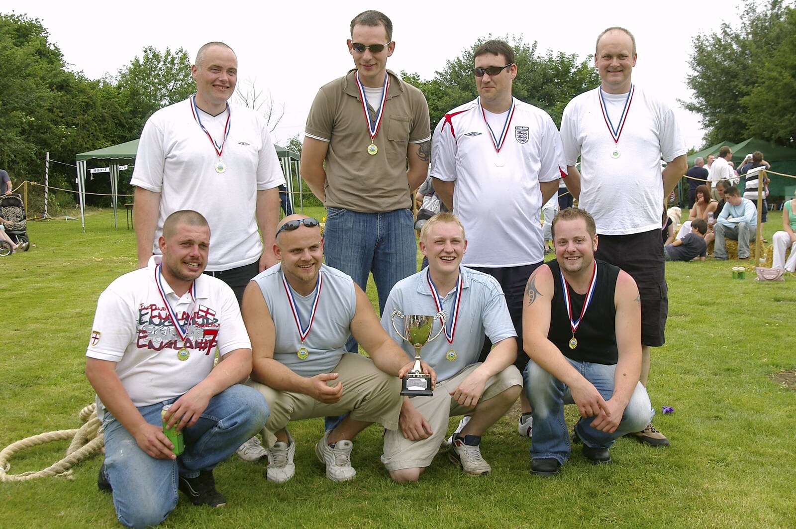 The winners of the tug 'o' war pose for a photo from The Village Fête, Yaxley, Suffolk - 18th June 2006