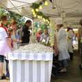 People throng a confectionery stall, A French Market Visits, Diss, Norfolk - 24th June 2006