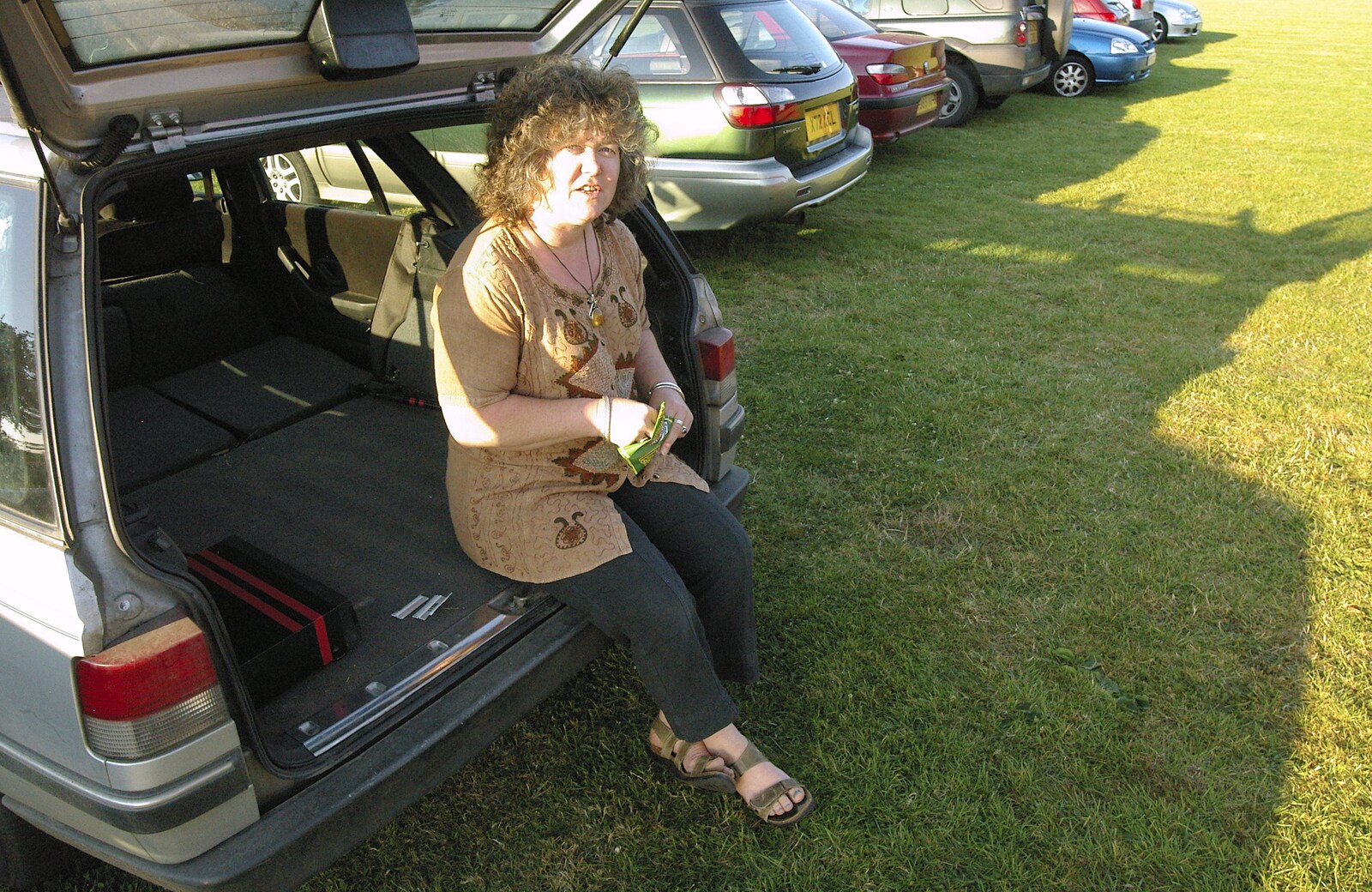 Jo does a roll-up from the back of her car from The BBs Play Athelington Hall, Horham, Suffolk - 29th June 2006
