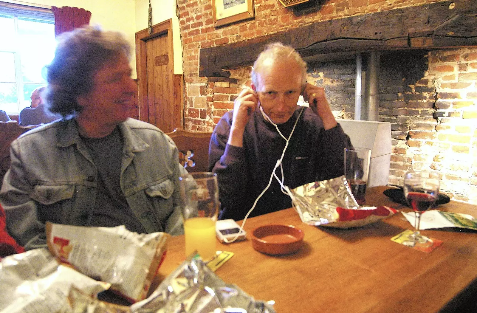 Henry listens to something on earphones, from The BBs Play Athelington Hall, Horham, Suffolk - 29th June 2006