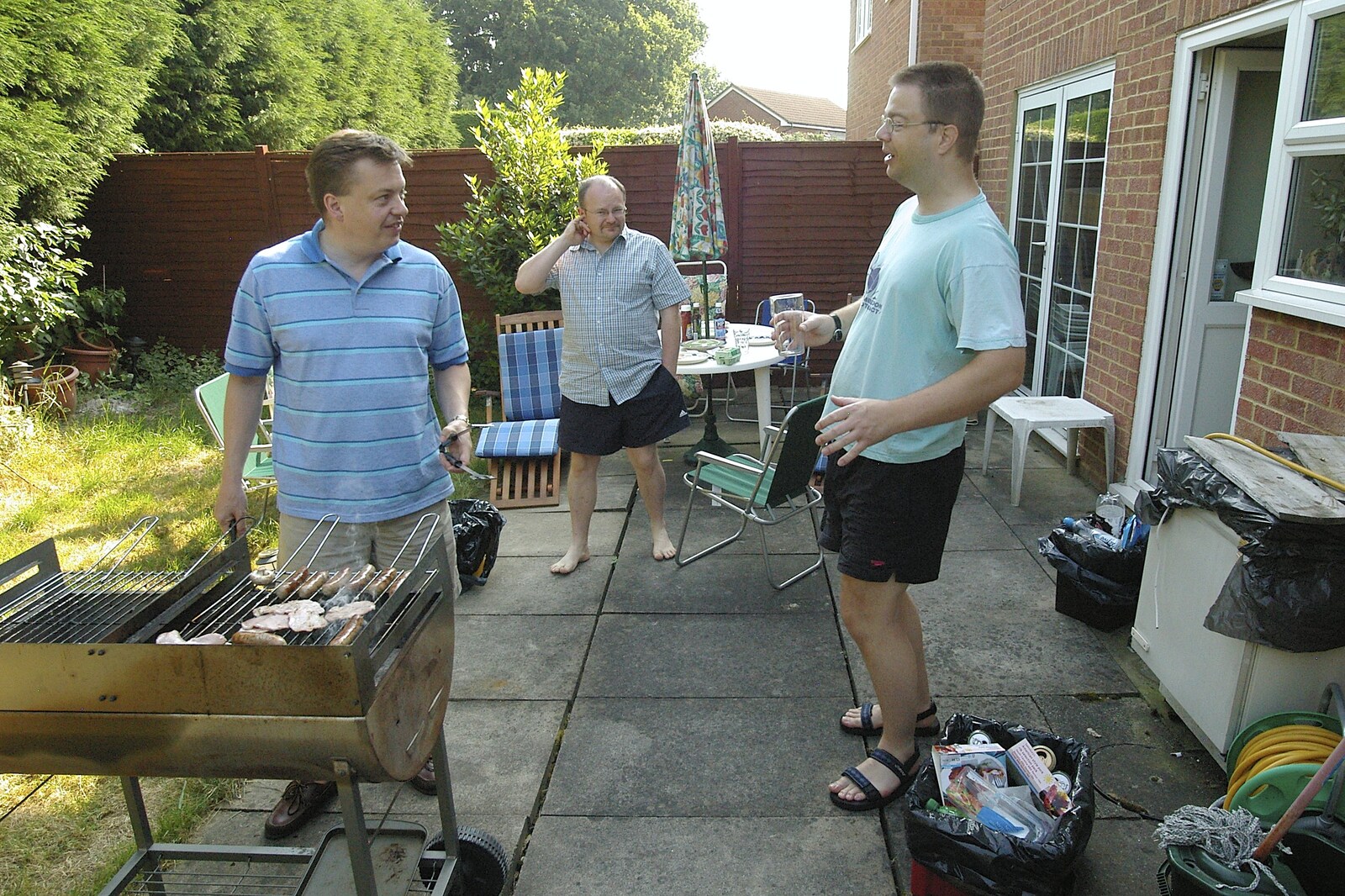 Simon's mate's on sausage duty from Simon's Birthday Barbeque, Reading, Berkshire - 30th June 2006