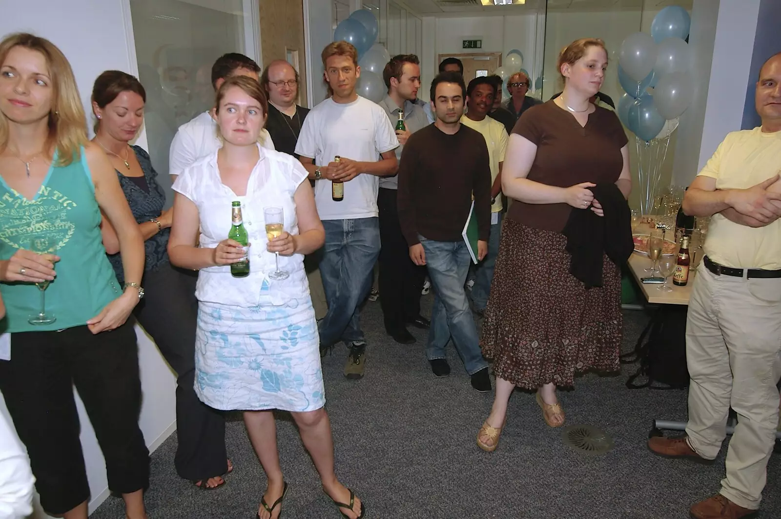 Isobel holds a glass, from Qualcomm's New Office Party, Science Park, Milton Road, Cambridge - 3rd July 2006