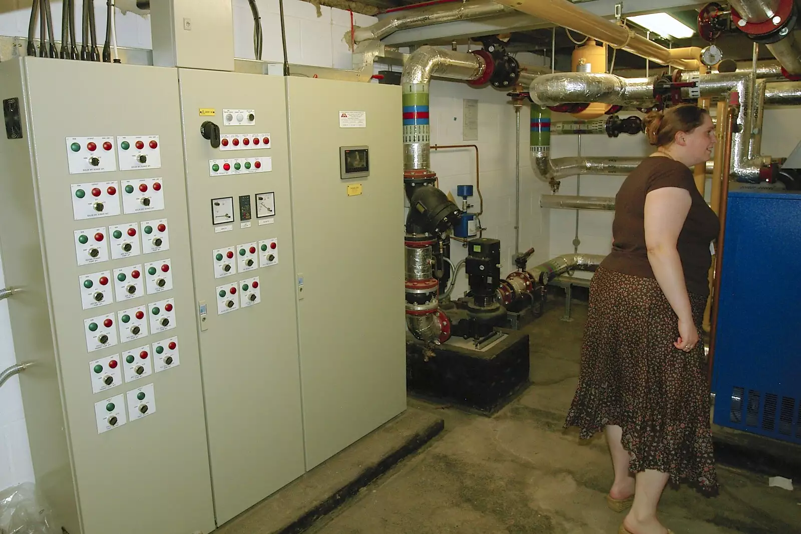 Louise investigates the plant room, from Qualcomm's New Office Party, Science Park, Milton Road, Cambridge - 3rd July 2006