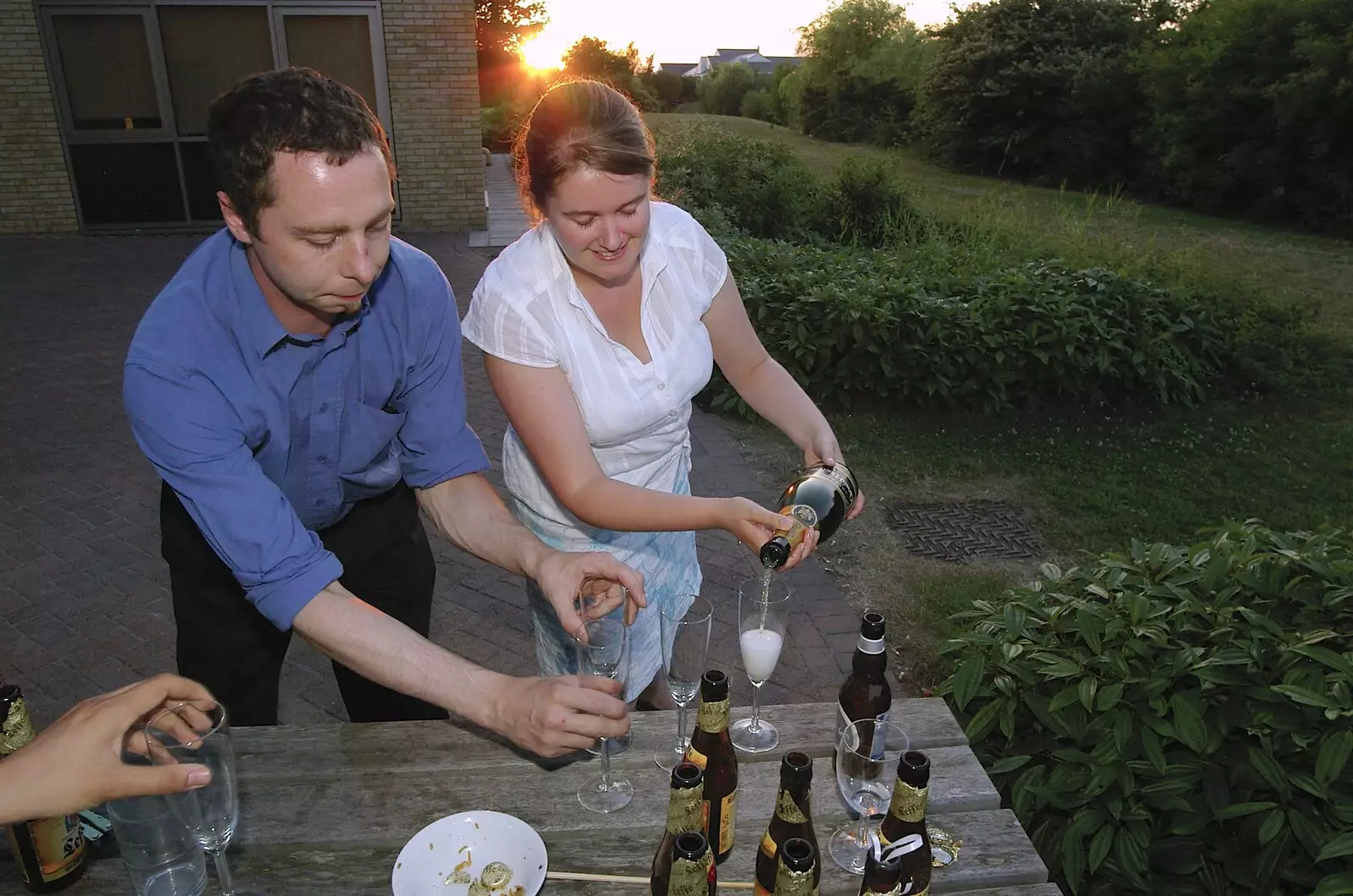 Isobel does the pouring honours, from Qualcomm's New Office Party, Science Park, Milton Road, Cambridge - 3rd July 2006