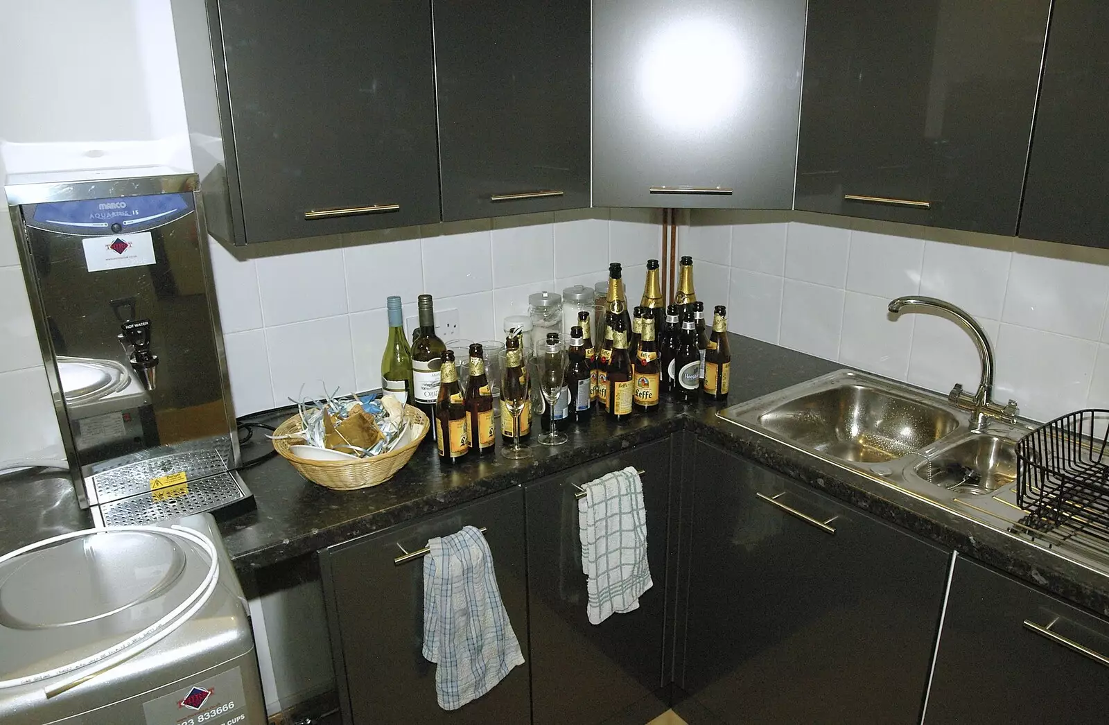 An array of empty bottles in the kitchen, from Qualcomm's New Office Party, Science Park, Milton Road, Cambridge - 3rd July 2006