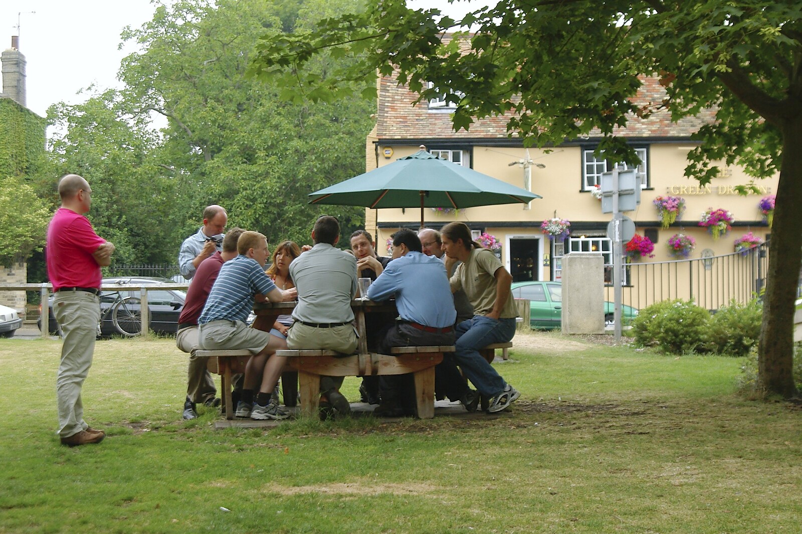 Huddled on a bench at the Green Dragon from Hilary Leaves Qualcomm, The Green Dragon, Water Street, Cambridge - 5th July 2006