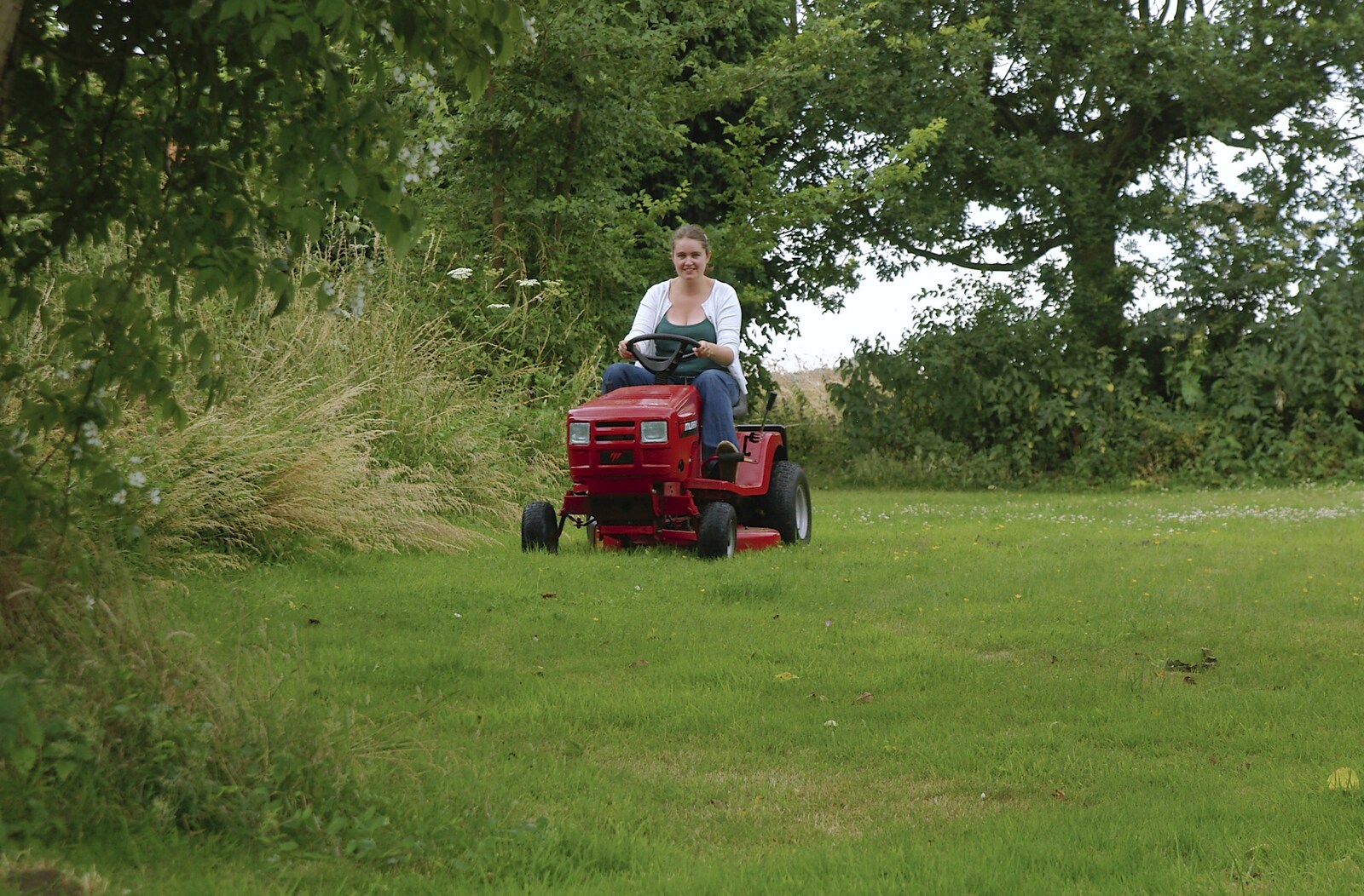 Isobel mows the lawn from The BBs Play Yaxley Hall, Yaxley, Suffolk - 7th July 2006