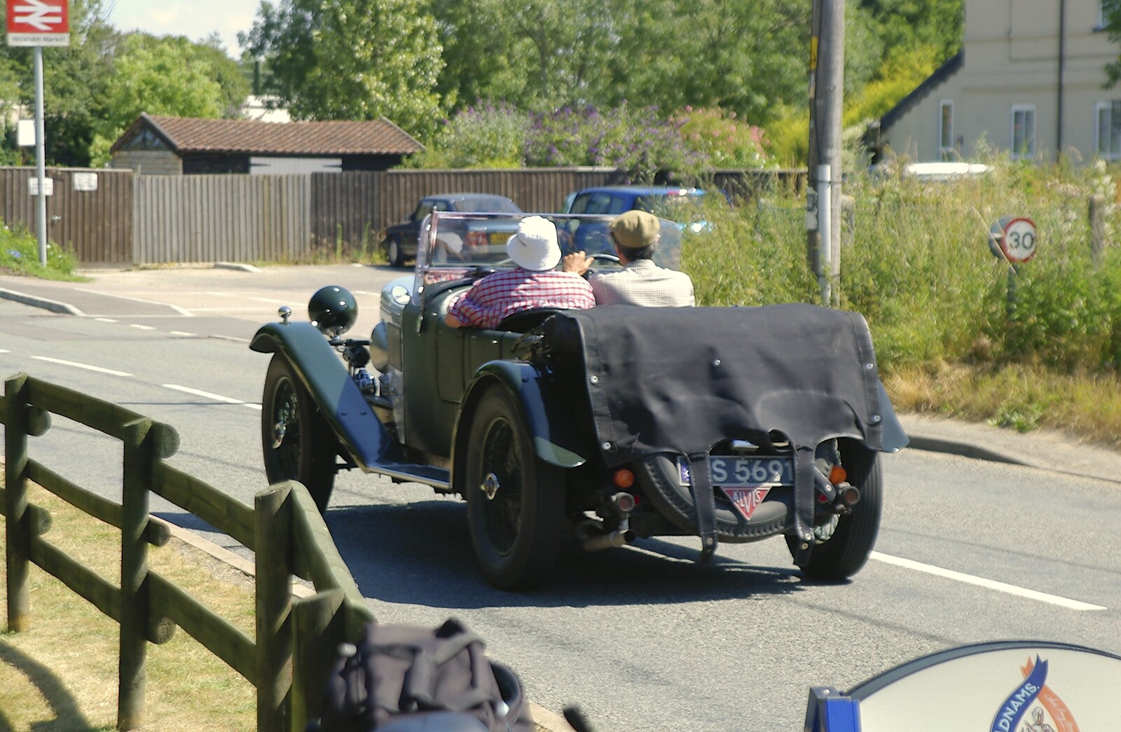 A Morgan or something drives past from The BSCC Charity Bike Ride, Orford, Suffolk - 15th July 2006