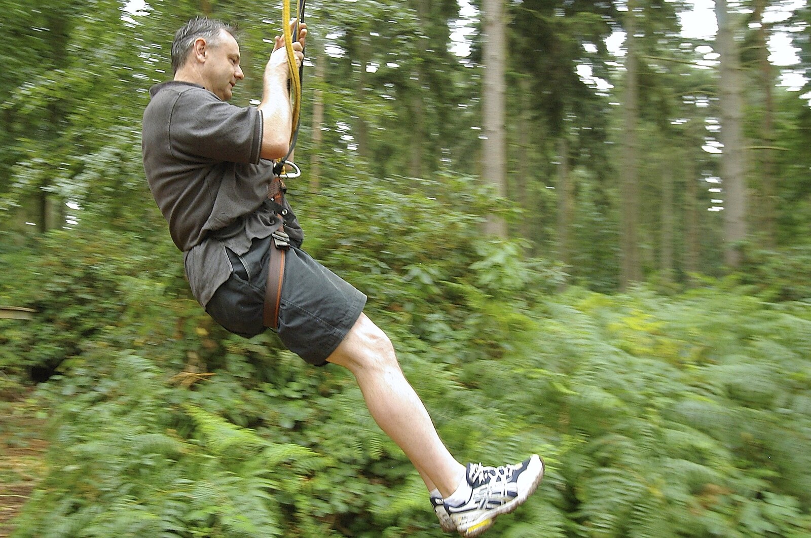 Dave slides down from Qualcomm Cambridge "Go Ape", High Lodge, Thetford Forest - 27th July 2006