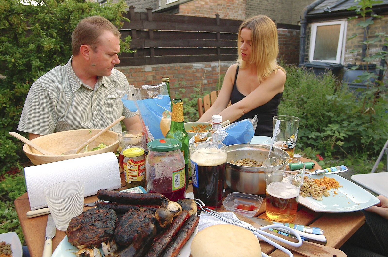 Janet, James and some carbonised meat from A Kingston Street Barbeque with Rachel and Sam, North Romsey, Cambridge- 2nd August 2006