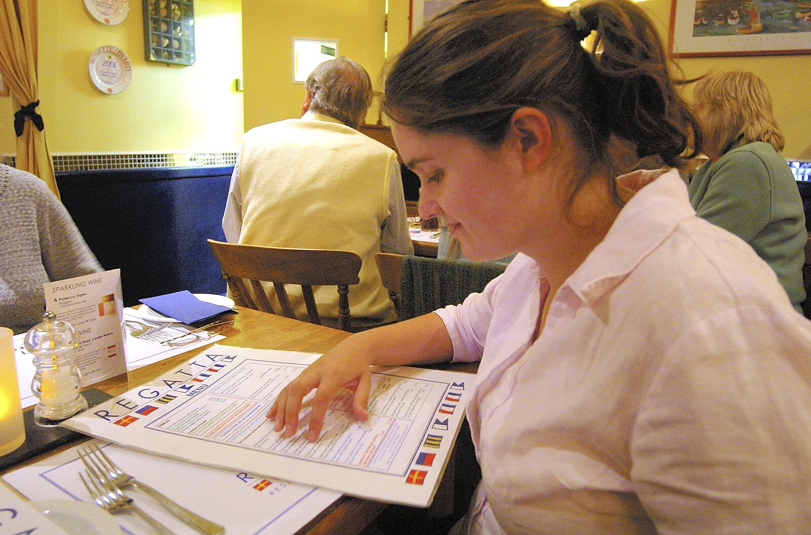 Isobel chooses food from The Regatta Restaurant with Mother and Mike, Aldeburgh, Suffolk - 10th August 2006