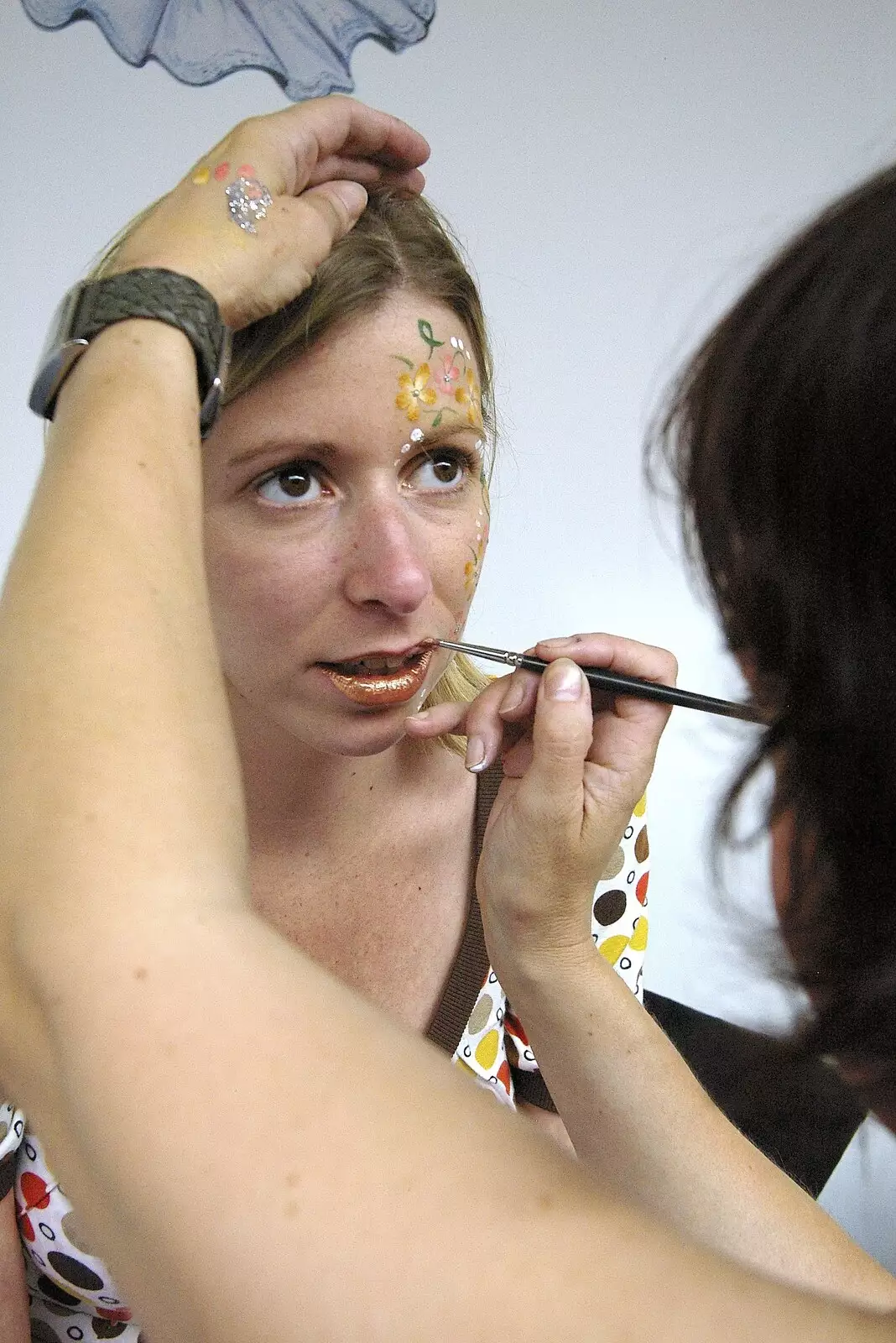 Lucy gets her face painted, from Qualcomm's Summer Circus Thrash, Churchill College, Cambridge - 18th August 2006