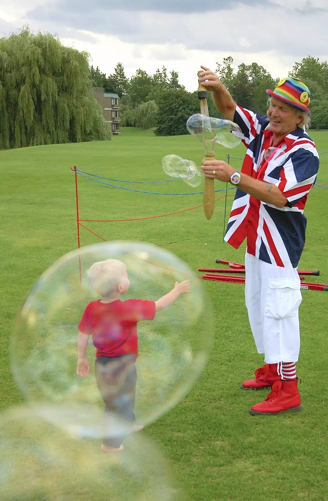 The boy in the bubble, from Qualcomm's Summer Circus Thrash, Churchill College, Cambridge - 18th August 2006