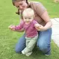 Isobel plays around with Nadine-sprog, Qualcomm's Summer Circus Thrash, Churchill College, Cambridge - 18th August 2006