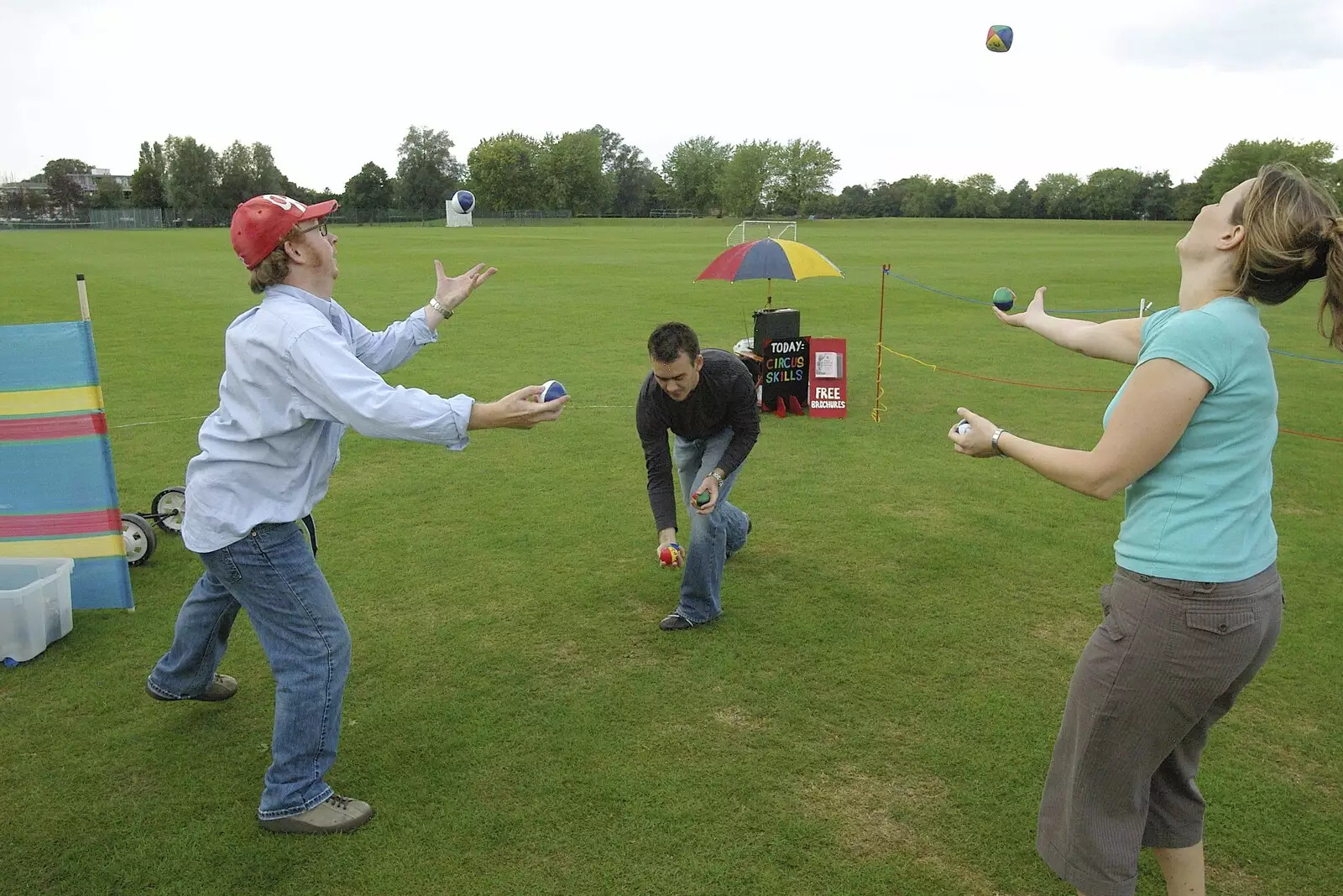 Julian, James and Kat practice their 'skills', from Qualcomm's Summer Circus Thrash, Churchill College, Cambridge - 18th August 2006