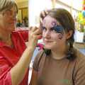 Isobel gets a bit of artwork applied, Qualcomm's Summer Circus Thrash, Churchill College, Cambridge - 18th August 2006