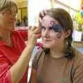 Isobel gets a bit of artwork applied, Qualcomm's Summer Circus Thrash, Churchill College, Cambridge - 18th August 2006