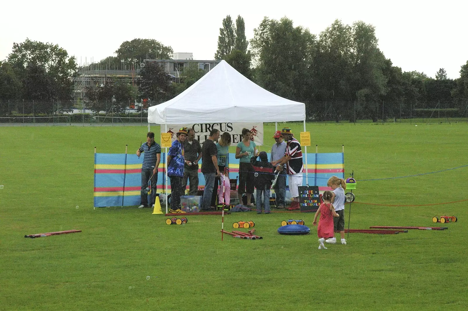 Sheltering from the rain, from Qualcomm's Summer Circus Thrash, Churchill College, Cambridge - 18th August 2006