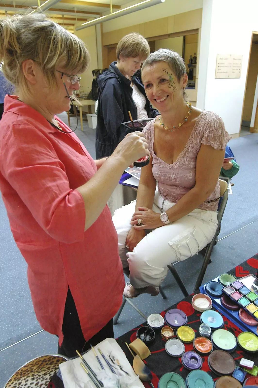 Mrs Tim has a go at face painting, from Qualcomm's Summer Circus Thrash, Churchill College, Cambridge - 18th August 2006