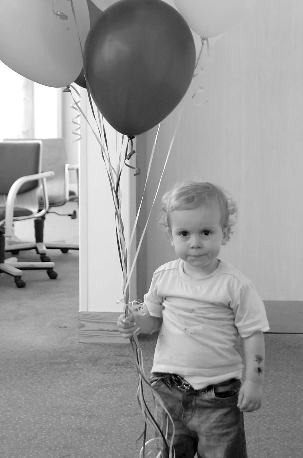 A small child with balloons, from Qualcomm's Summer Circus Thrash, Churchill College, Cambridge - 18th August 2006