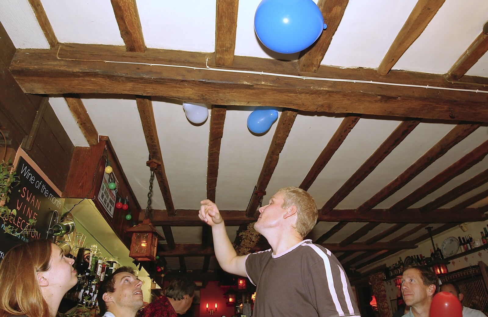 Bill sticks balloons to the ceiling with static from his head from Alan's Birthday at the Swan Inn, Brome, Suffolk - 18th August 2006