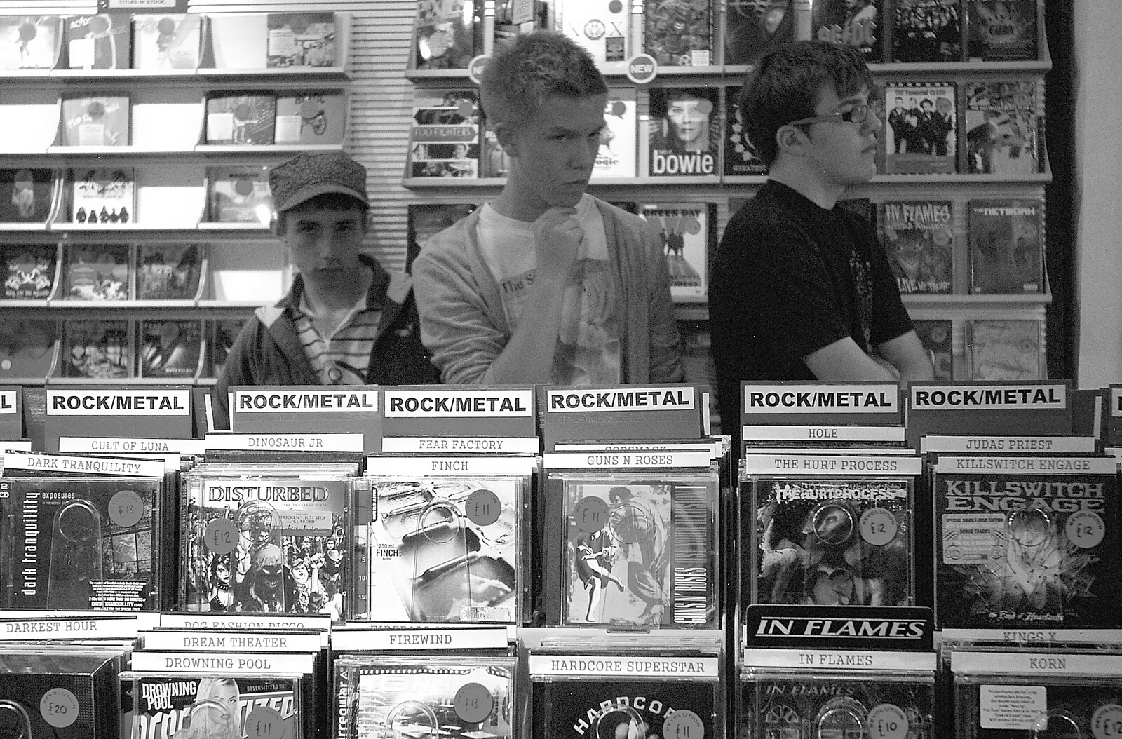 Rory Hill hides behind the CD racks from Grantchester Meadows, Alex Hill at Revs and Spitfires - 10th September 2006
